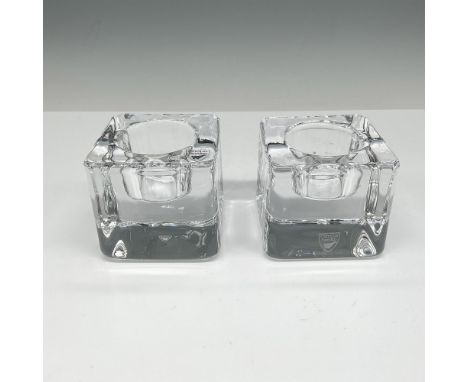Lovely, simple design in cubed form with center holder. Orrefors mark. Issued: 21st centuryDimensions: 3"L x 3"W x 2.5"HManuf