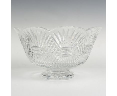 A lovely, fluted crystal bowl with hand-cut fan and diamond patterns. Waterford mark. This item has its original box which me