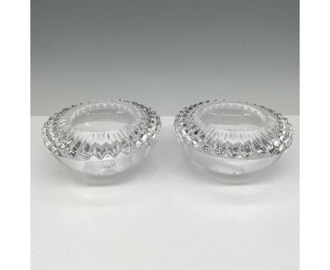 Round clear crystal base rimmed with pleat cut crystal. Orrefors mark. 6719483. This item has its original box: 5"L x 5"W x 2