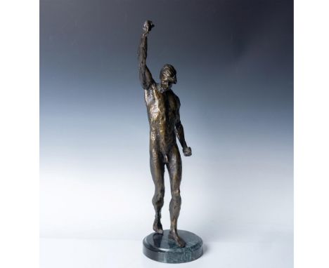 Bronze sculpture of a man standing with his right arm raised, hand clenched in a fist, on green marble base. Weight: 19 pound