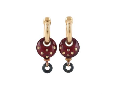 LA BAGUE NOUVELLE, A PAIR OF ENAMELLED GOLD COLOURED EAR PENDANTS  The polished gold coloured hoops suspending a red enamelle