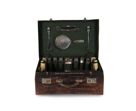 Y&nbspA CROCODILE LEATHER TRAVEL CASE WITH SILVER MOUNTED DRESSING TABLE ITEMS ALEXANDER CLARK MANUFACTURING CO., LONDON 1910