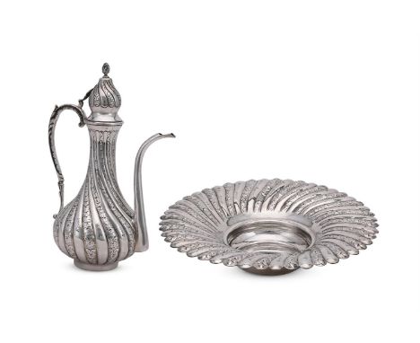 A TURKISH SILVER COLOURED BALUSTER EWER AND SHAPED CIRCULAR BOWL STAMPED 900 SK The ewer with a bud finial to the wrythen dom