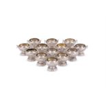 THIRTEEN GEORGE III SILVER URN SHAPED SALTS