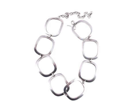 IBE DALQUIST FOR GEORG JENSEN, NO. 192 H, A SILVER COLOURED NECKLACE  CIRCA 1970  The cushion shaped hooped panels to a belch