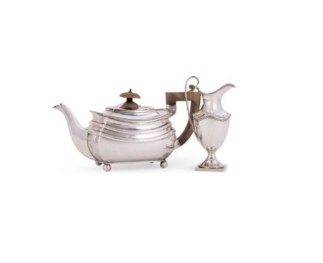 A SILVER OBLONG BALUSTER TEA POT S. BLANCKENSEE & SON LTD., CHESTER 1936 With a wooden oblong finial and harp handle, a gadro