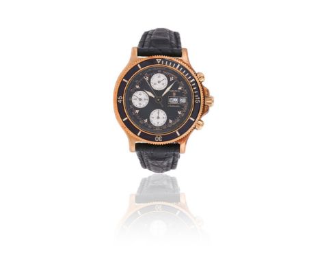 Y&nbspCHRYSOS  A GOLD COLOURED CHRONOGRAPH WRIST WATCH WITH DAY AND DATEMovement: Cal. ETA 7750, automatic chronograph, 17 je