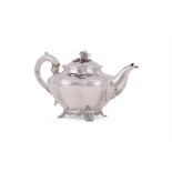 Y A WILLIAM IV SILVER LOBED CIRCULAR TEA POT