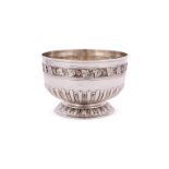 AN EDWARDIAN SILVER PEDESTAL PUNCH BOWL