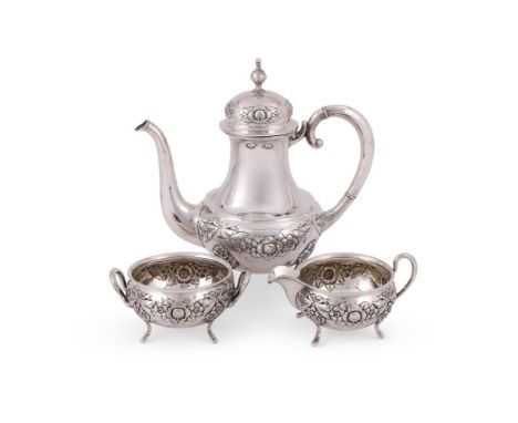 A CONTINENTAL SILVER COLOURED THREE PIECE TEA SET STAMPED 830S, PROBABLY NORWEGIAN The tea pot with a baluster finial to the 