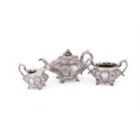 Y A VICTORIAN MATCHED SILVER THREE PIECE LOBED CIRCULAR TEA SET