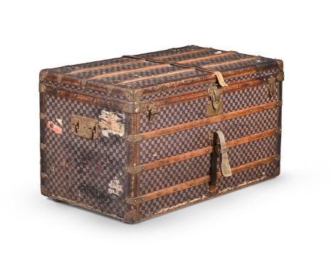 LOUIS VUITTON A CHEQUERED COATED CANVAS HARD TRAVEL TRUNK, NO. 42809, 20TH CENTURY With brass and leather trim, two metal loo