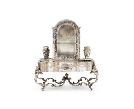 A GERMAN SILVER COLOURED INKSTAND IN THE FORM OF A MINIATURE CABINET ON TABLE POST 1886 .800 STANDARD With a glazed hinged do