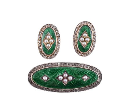 AN ENAMEL AND DIAMOND BROOCH AND EAR STUDS The brooch with an oval green enamelled panel, with a central quatrefoil of half s