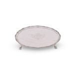 A GEORGE III SILVER SHAPED CIRCULAR SALVER