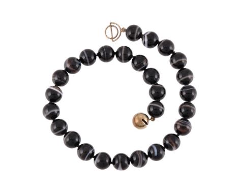 A BANDED AGATE NECKLACE  The polished banded agate beads on a knotted strand, to a gilt silver coloured orb clasp; and a circ