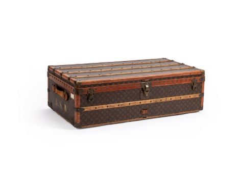 LOUIS VUITTON  A MONOGRAMMED COATED CANVAS HARD TRAVELLING TRUNK, NO. 788887, 20TH CENTURY With leather and brass trim, wood 