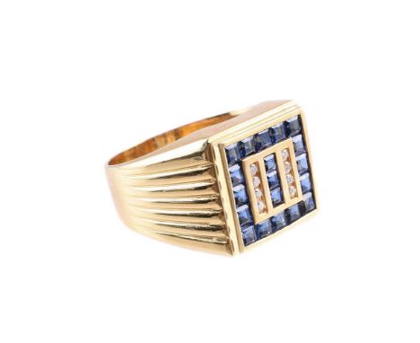 A SAPPHIRE AND DIAMOND DRESS RING  The square panel channel set with step cut sapphires, the centre with two rows of brillian