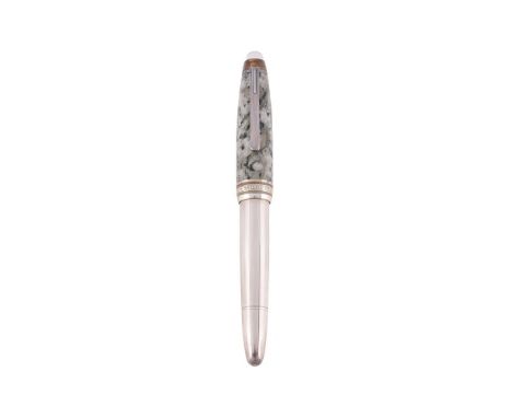 MONTBLANC, SOULMAKER  A LIMITED EDITION GRANITE AND SILVER COLOURED FOUNTAIN PEN, 1687/1906  Cap and Barrel: With polished gr