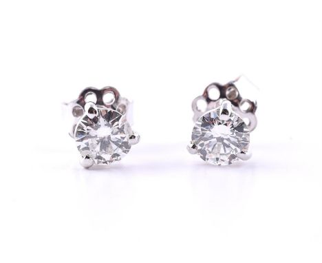 A PAIR OF DIAMOND SINGLE STONE EAR STUDS The brilliant cut diamonds in four claw settings, approximately 1.10 carats total Si