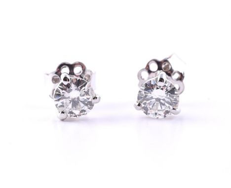 A PAIR OF DIAMOND SINGLE STONE EAR STUDS The brilliant cut diamonds in four claw settings, approximately 1.10 carats total Si