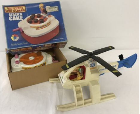 A vintage Fisher Price Adventure People Rescue helicopter with figures, circa 1970's. Together with a vintage boxed Matchbox 