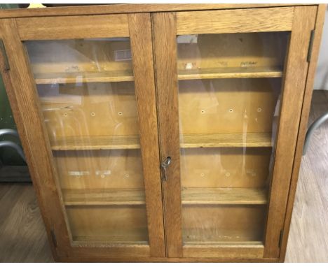 A light oak display cabinet suitable for model cars etc.  74 x 72cm