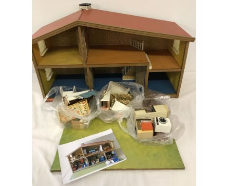 Vintage c.1970's Lundby all electric dolls house, made in Sweden. Fully furnished and with electricity transformer.  With gar