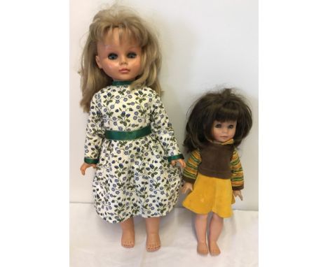 A vintage Gotz-Puppe vinyl doll in original dress with close eye action, approx. 16" tall. Together with 1970's Palitoy large