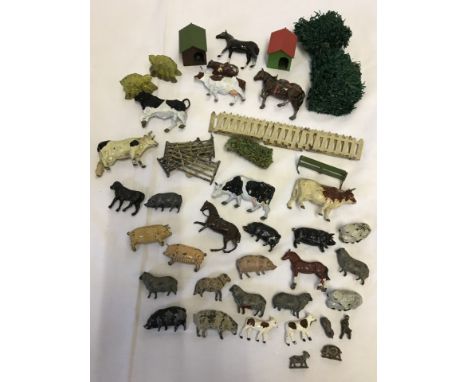 A box of vintage lead farm animals and accessories. To include Britains and Hill & Co. 
