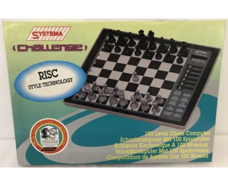 A vintage boxed Systema "Challenge" electronic chess game.  