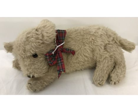 Merrythought vintage blond plush dog pyjama case. Label under rear leg. Measures approx 19" long.