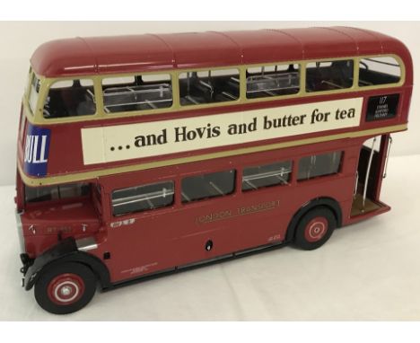 A Sun Star diecast London Transport double decker bus. With Hovis and Black & White Scotch Whisky advertising. RT 852. Scale 