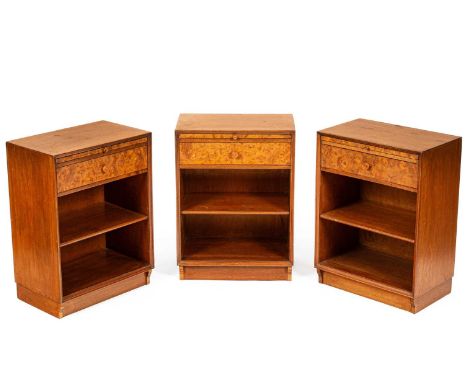 Cornubia Cabinet Works, circa 1930 three mid 20th century walnut and burr ash bedside cabinets, each with a brushing slide ab