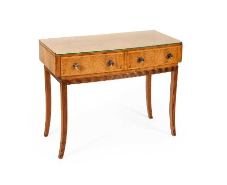 An Art Deco walnut and walnut flamed side table, the top above two drawers with circular silver coloured handles, on reeded s