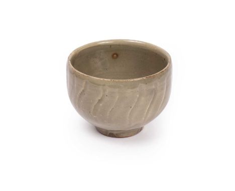 ARR Rupert Spira (born 1960) a celadon glazed bowl, its exterior decorated by incised curved lines, 12cm diameterIn good cond