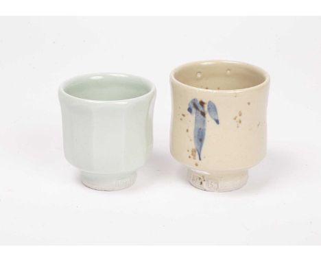 ARR Jim Malone (born 1946) a pale celadon eleven-sided yunomi-style beaker, 8cm high, and a cream glazed yunomi-style beaker 