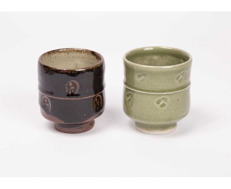 ARR Jim Malone (born 1946) a yunomi style celadon glazed beaker with ten dimpled medallions, 9cm high and a tenmoku glazed be