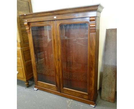 Victorian mahogany two door glazed bookcase with one shelf. (B.P. 21% + VAT)  Dimensions: W146xH160xD36.5cm approx.