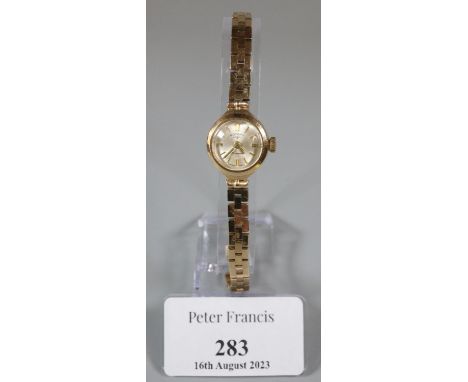 Rotary 9ct gold 17 jewel ladies wristwatch with 9ct gold bracelet strap.  Overall 12.9g approx.  (B.P. 21% + VAT) 