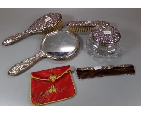 Early 20th century ladies dressing table set comprising: hand mirror, two brushes and a glass jar and cover together with a s