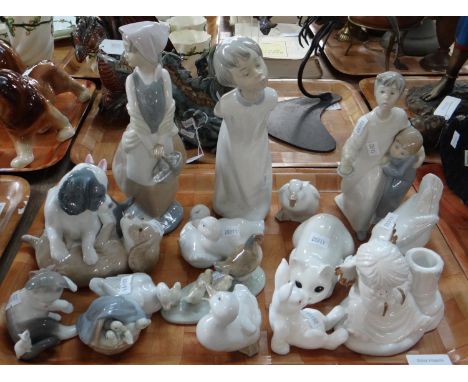 Tray of animal and human figures to include: Spanish porcelain Nao puppies, girl with basket, chickens and ducks, Lladro duck