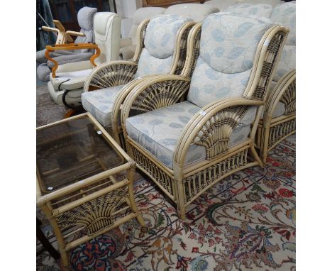 Modern upholstered and wicker conservatory suite comprising two seater sofa, two armchairs and a glass topped coffee table. (