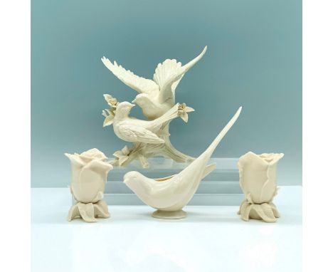 A set of 4 cream-colored items that features two exquisite rose candleholders, a graceful dove bowl, and a charming figure of