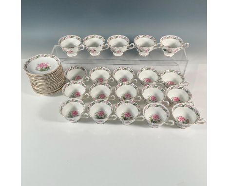 Charming set of cups and saucers; 20 cups and 18 saucers. Beautiful pink flowers and green leaves decorate the borders and bo