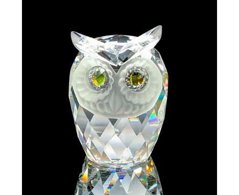 This Swarovski crystal large owl was part of the Woodland Friends collection. The owl has a clear crystal body, and a frosted