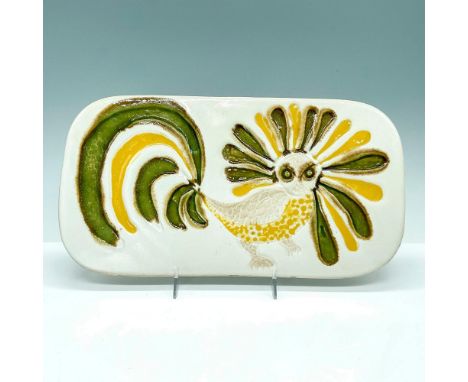 Attractive hand pressed ceramic wall plaque depicting bird like creature with beautiful green and yellow glaze. Stamped on ba