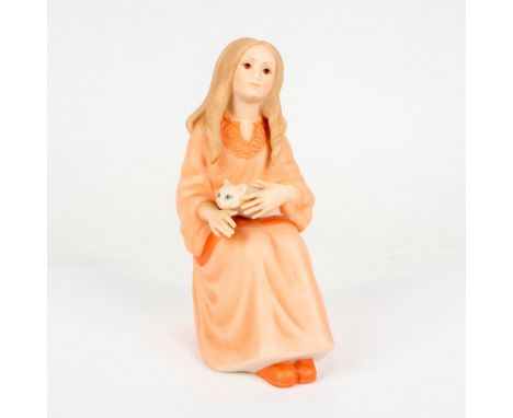 Designed by world renowned sculptor. Features a young woman in peach toned coloration seated with a feline on her lap. Artist