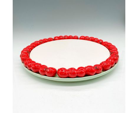 Round white platter decorated with strawberries on edge with base colored in light green. Sheffield sticker. This item has it