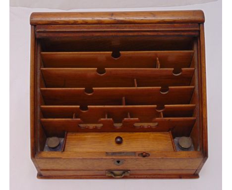 A light oak early 20th century tambour front stationery box, 30 x 78 x 25cm